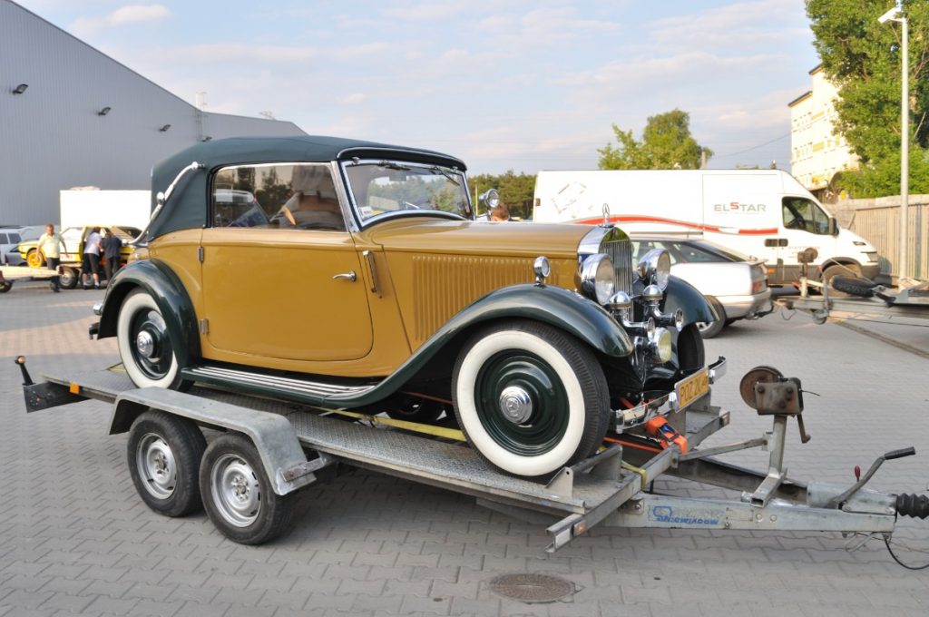 vintage vehicle getting towed
